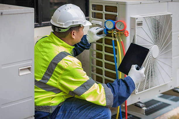 Professional Hvac technician working in Fuquay-Varina, NC
